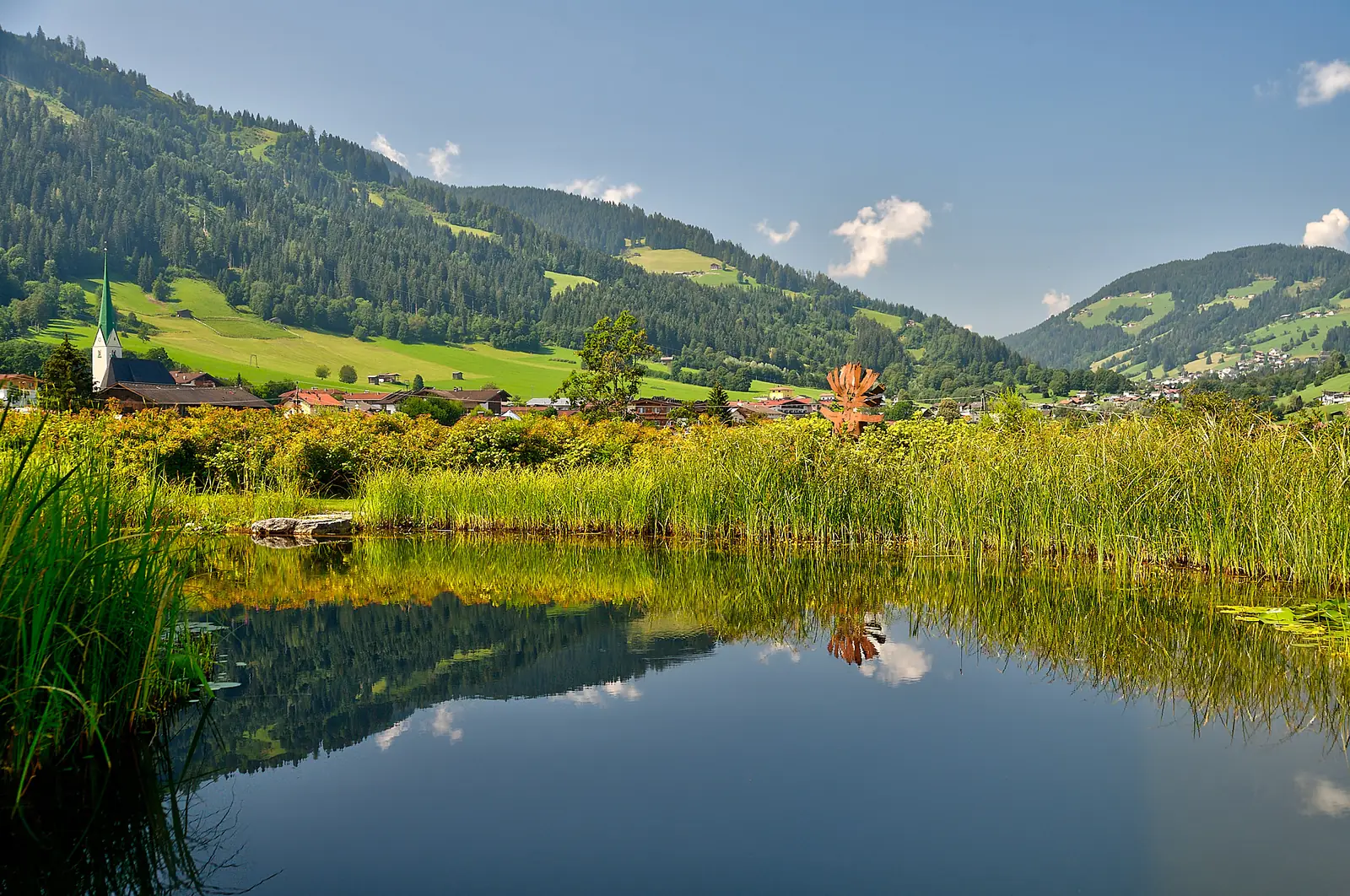 Ein Bergsee nach Maß – Schwimmteich in Tirol